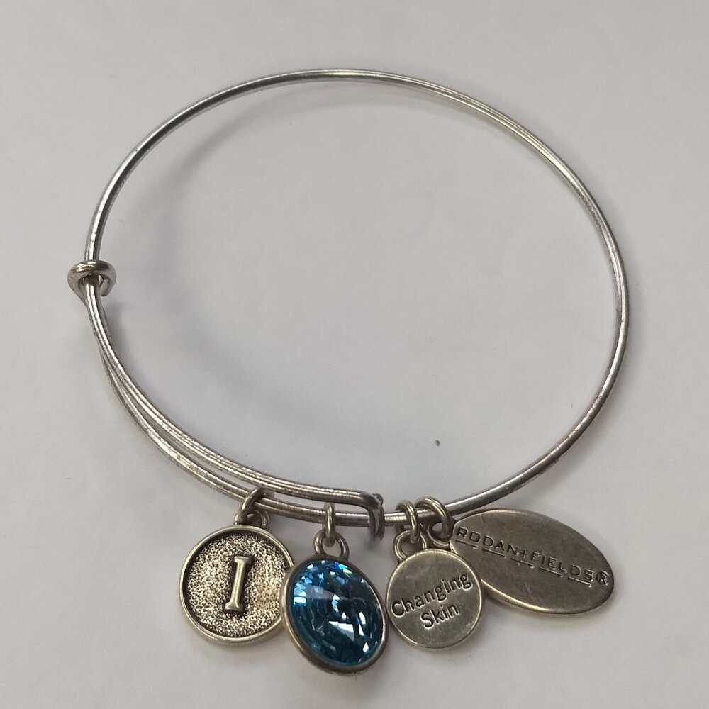 Rodan and Fields Level One Bracelet 4 Charms Silver Tone Blue Stone Level 1 I